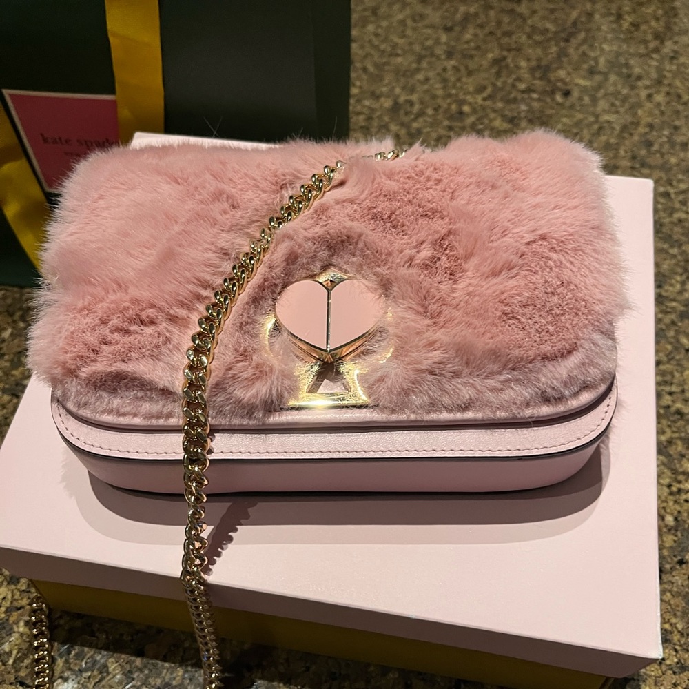 Brand new Kate Spade bag. Received as a gift so there are no tags.